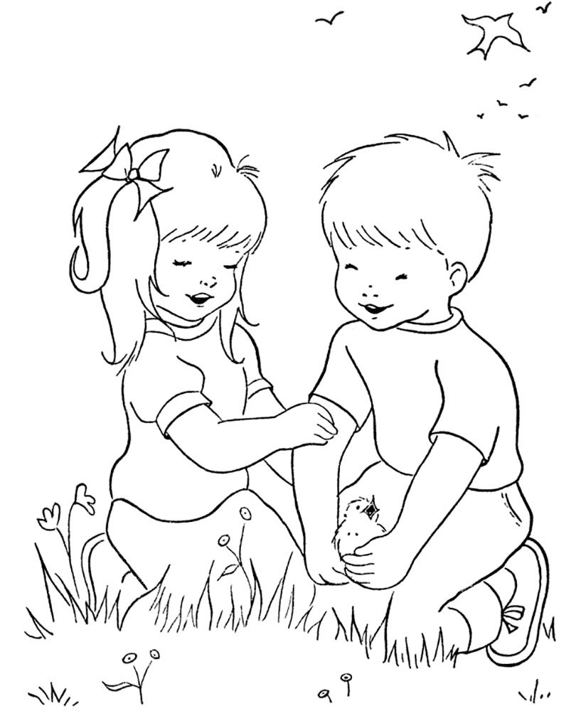 Дівчинка і хлопчик на траві